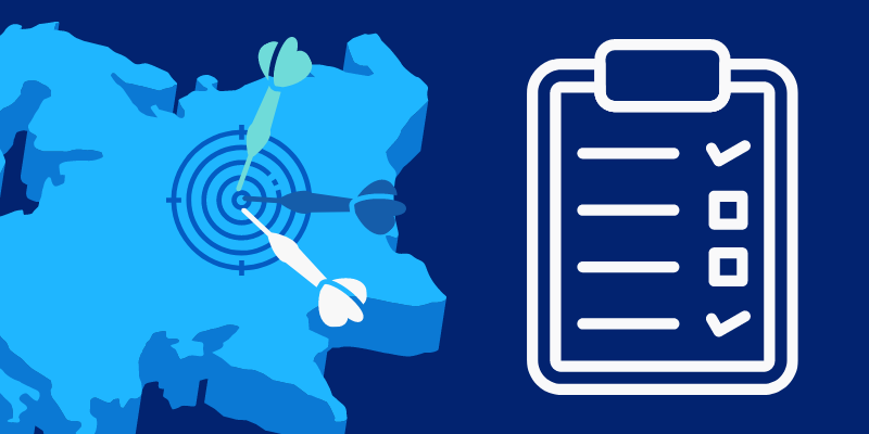 A map with darts hitting a targeted area, accompanied by a checklist on a clipboard