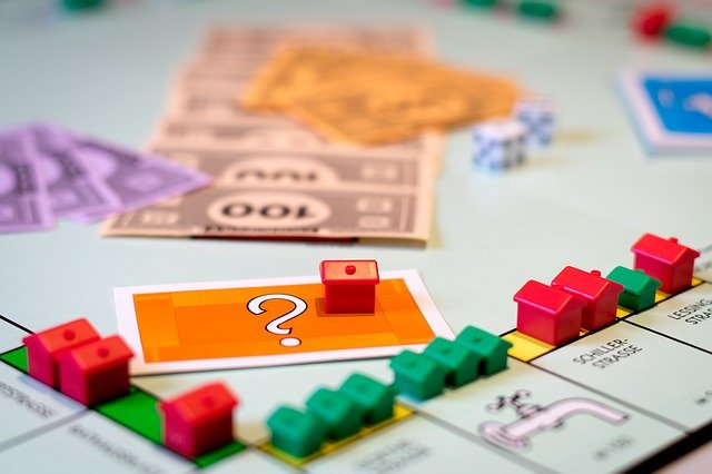 Game board with buildings developed on properties