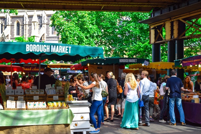 A local market featuring stalls with various types of products